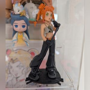 Gigi: The Singer from the POP MART Peach Riot Rise Up Series.
